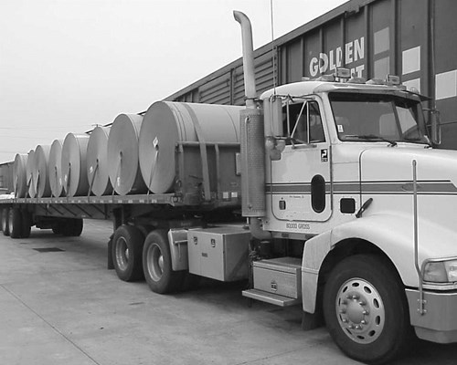 Picture of truck with paper rolls on the back