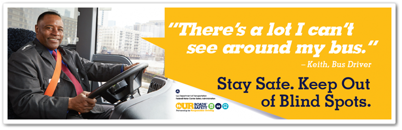 Voices of Safety billboard ad with bus driver, "there's a lot I can't see around my bus" - Keith, Bus Driver; Stay Safe. Keep Out of Blind Spots.