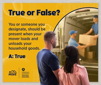 Couple looking at movers on a truck