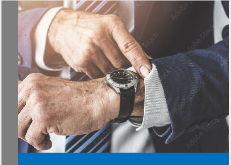 A man's hands with a watch