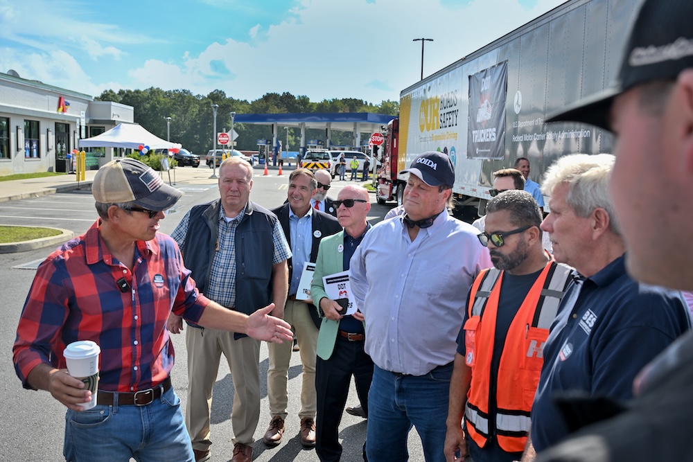 Secretary Duffy talking with partners and drivers