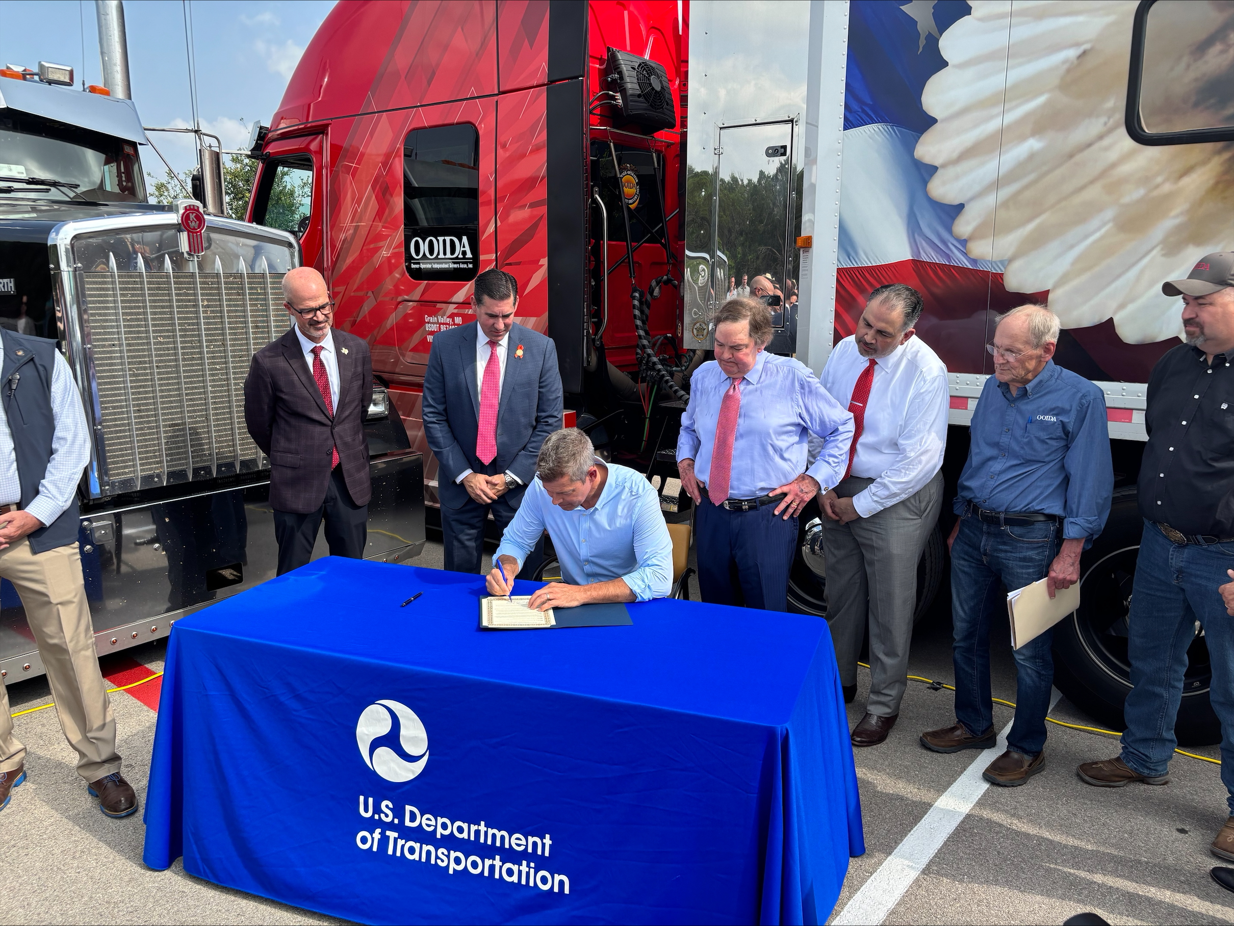 U.S. Department of Transportation (USDOT) Secretary Sean P. Duffy signed an order at a trucking event in Austin announcing new guidelines to strengthen English language enforcement for commercial truck operators.