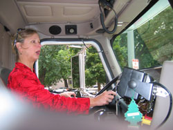 Dr. Barbara Phillips behind the wheel of a Safeway truck