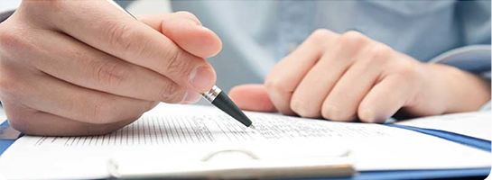 Photo of a person writing
