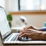 hands on laptop