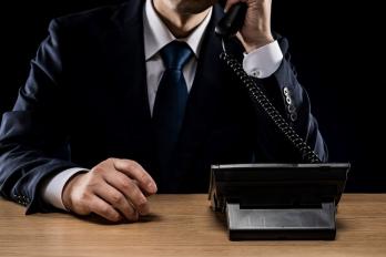Person speaking on the phone