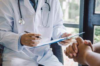 Doctor examining a chart