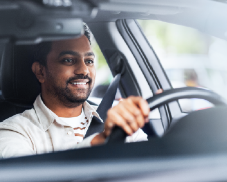 Man driving a passenger vehicle